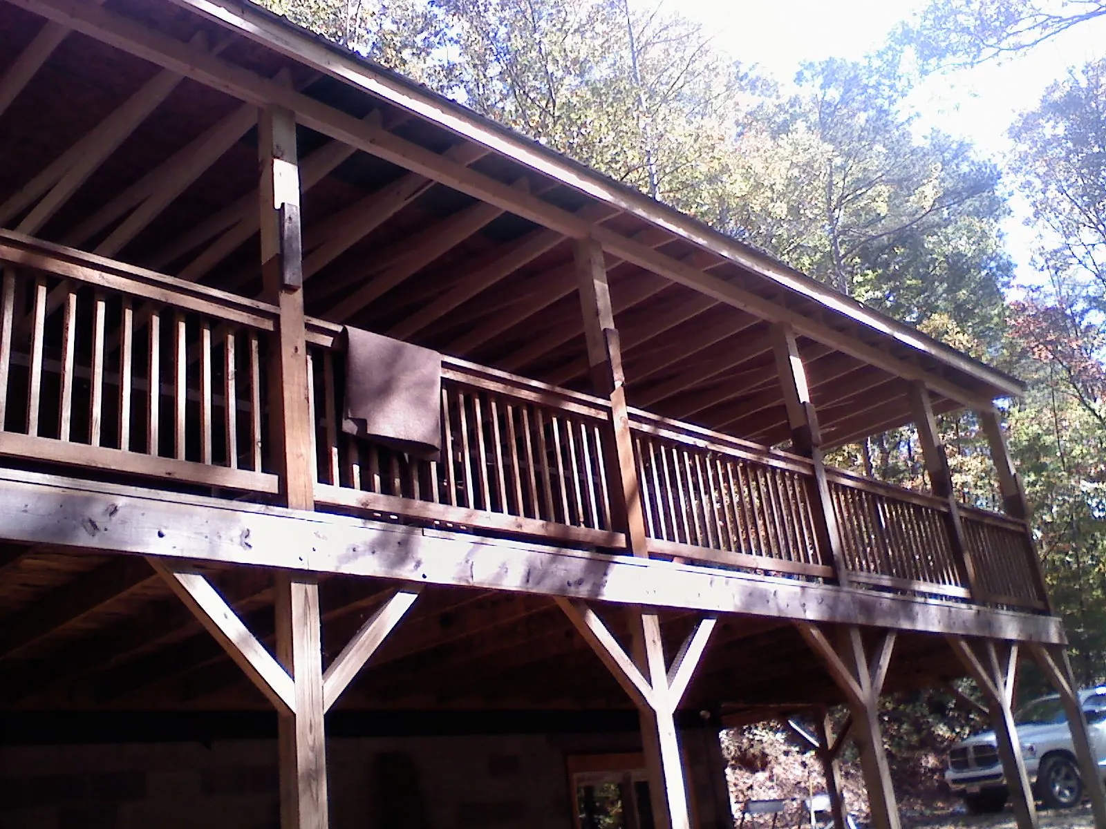 Timber framing under a new elevated porch and deck — Roof Leak Repair in Mount Joy by Roofing Brothers